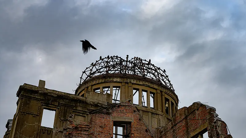 The Hiroshima Peace Memorial, commonly known as the Atomic Dome, was a building which remained partially intact after the atomic bombing of Hiroshima, Japan in WWII.