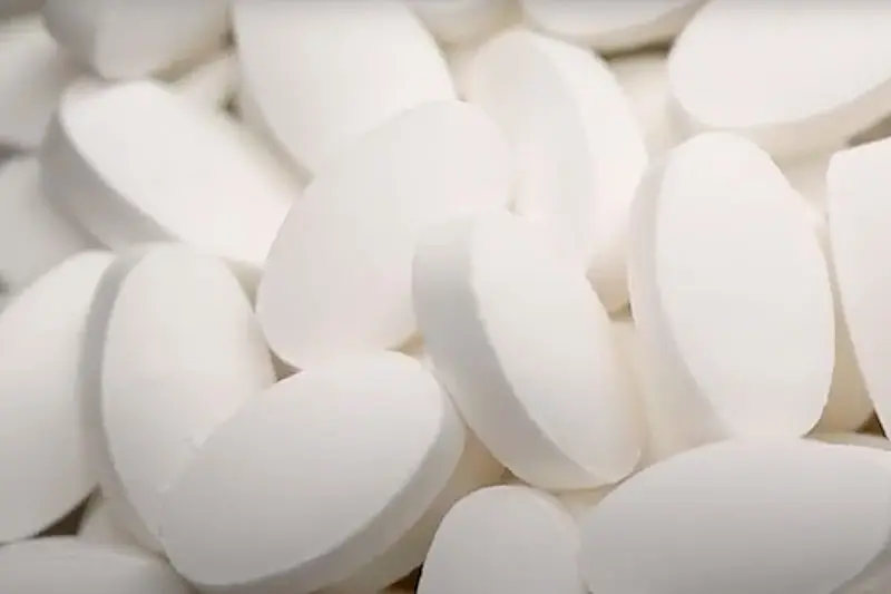 A pile of white pills.